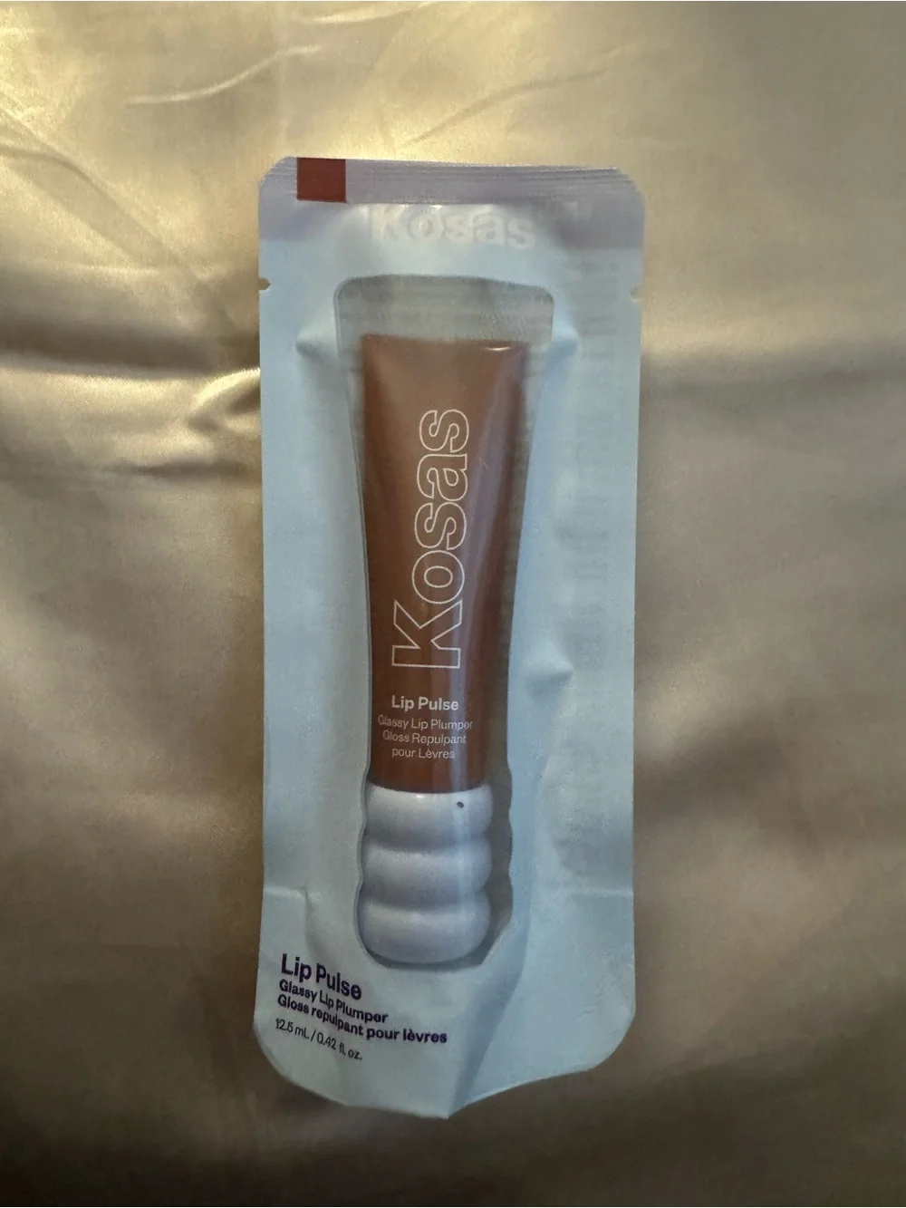 New Kosas Lip Pulse Glossy Lip Plumper — Sixth Sense (Sheer Warm Beige)